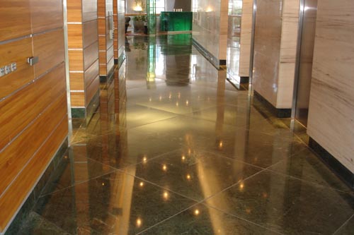 BriStone on granite lift lobby floor. BriStone creates an elegant feature of the floor.